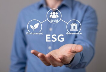 Person in blue shirt showing digital ESG interface with environment, social, and governance icons