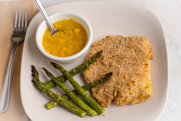  baked haddock with asparagus and cream corn
