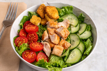 salad top with barbecue chicken bites