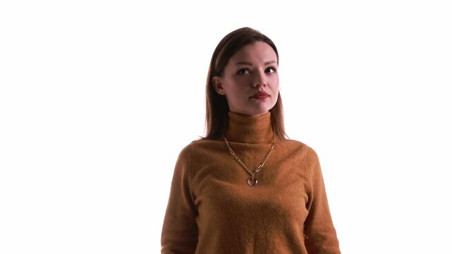 Woman in brown turtleneck rotating on white background. Concept of personal coaching platforms, self development content, emotional brand narratives, lifestyle and wellness focused digital services.