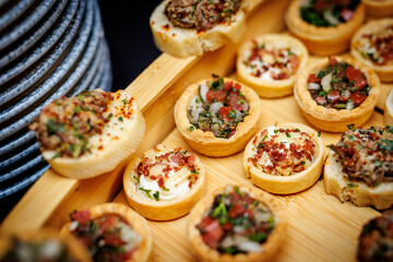 Mini tart snacks with assorted toppings