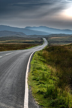 Abandoned Road Through Spectacular Rural Landscape Of Snowdonia National Park In North Wales, United Kingdom