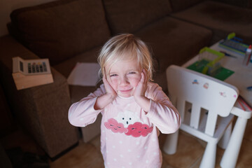 Surprised child looking with amazement, Wow emotion and unexpected news concept.