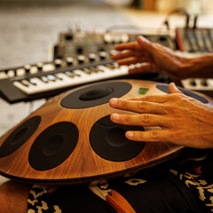 Musician Playing Handpan Instrument