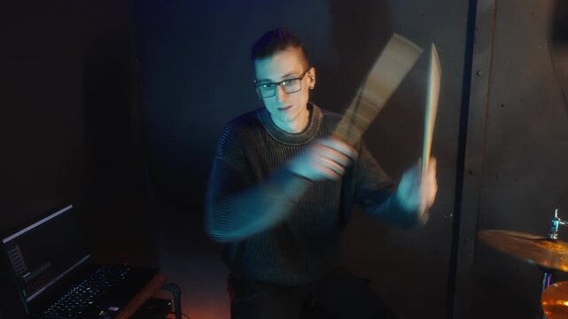 Performer checks playback while controlling rhythm and ambiance