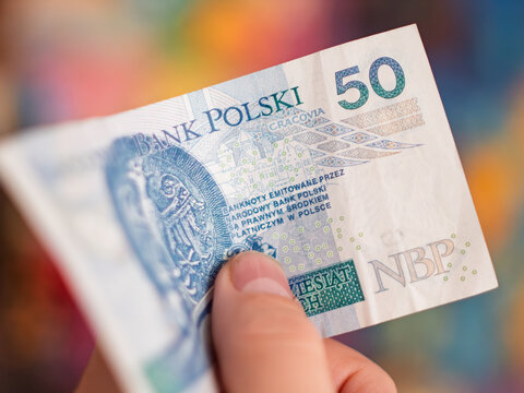 Polish 50 Zloty Banknote Held in Hand