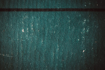 Distressed turquoise paper texture with cloth edge and black line, abstract vintage background for design.