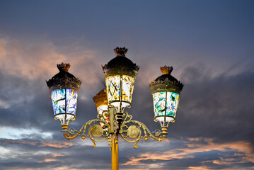 Lamppost decorated with colored glass	