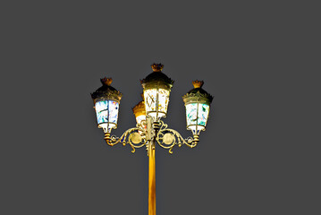 Lamppost decorated with colored glass	
