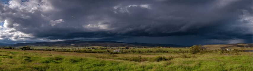 Fototapeta premium Dramatic stormy landscape nature's canvas panoramic hdr scene