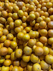 fresh oranges on black background