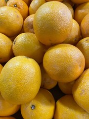 fresh oranges on black background