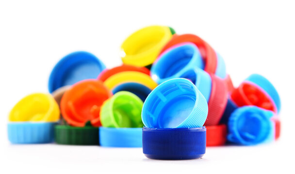Plastic bottle caps isolated on white background