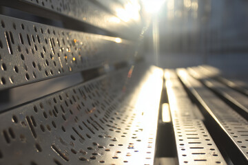 Detailed view of a bench surface illuminated by sunlight