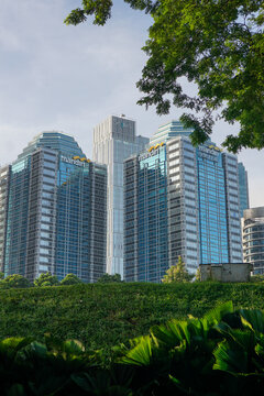 Jakarta, Indonesia. January 7, 2025. The Bank Mandiri building on Jalan Jenderal Sudirman seen from the Gelora Bung Karno Stadium City Park.