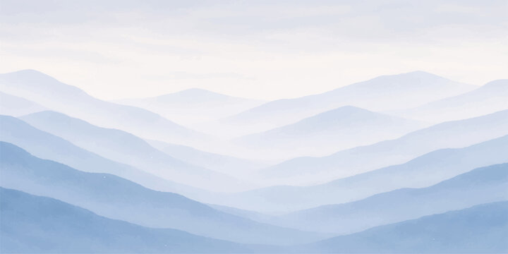 A misty mountain landscape featuring snow-capped peaks and a deep valley under a blue morning sky where the sun rises over the horizon to illuminate the clouds and forest hills