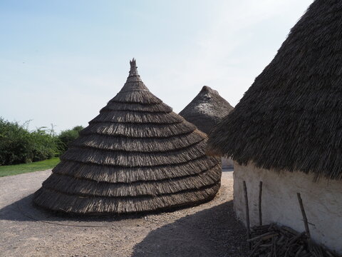 Traditional thatched beehive huts in open air museum