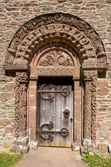 Fototapeta premium The extraordinary carving on the south doorway of the Norman Romanesque church of St Mary and St David (built 1140 AD) at Kilpeck, Herefordshire, England UK