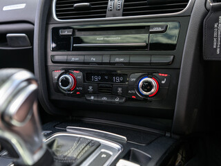 Fototapeta premium Car climate control panel with air conditioning and heated seats