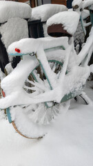 Snow-Covered Bicycle Outdoors in Winter: Quiet Urban Scene With Thick Fresh Snow