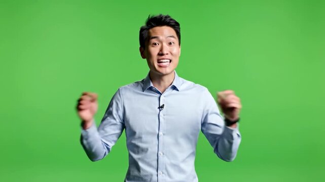 Man gesturing with hands and wearing a watch on green screen