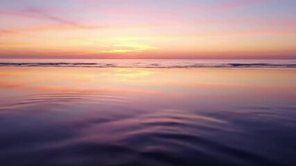 Sparkling Midday Water Shimmer Close-up or medium shot of the ocean surface under bright midday sun. Gentle ripples cause the intense sunlight to break into