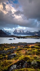Icelandic Landscape - A Serene View of Glacial Waters and Mossy Terrain.
