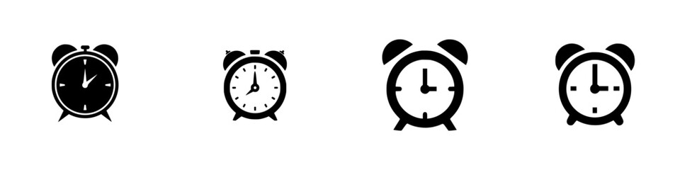 Different styles of alarm clocks showing time in black and white