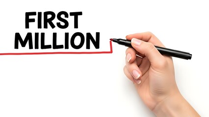 Close up of a female hand drawing a red line underneath the words first million with a black marker pen demonstrating goal achievement.