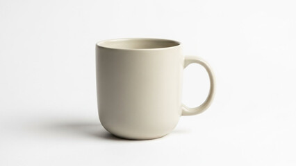 Fototapeta premium Modern ceramic coffee mug centered on a white background, soft studio lighting, minimal shadows