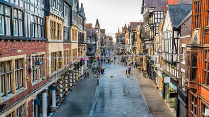 A view from the city walls west up Eastgate Street in the city of Chester, Cheshire, UK © Nicola