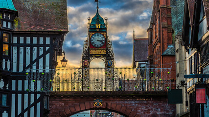 A view from Eastgate Street looking up at the top of the Eastgate in the old walls in the city of Chester, Cheshire, UK © Nicola
