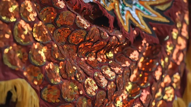 Dazzling Barongsai costume detail with red and gold sequins reflecting light. Macro wave-like effect resembling dragon scales in a luxurious 4K celebratory mood