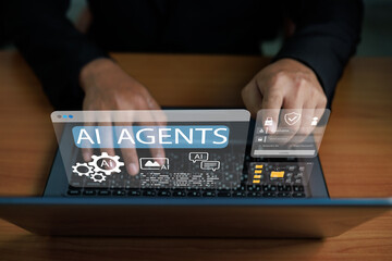 Businessman using laptop with AI Agents interface. Concept of autonomous software, smart virtual assistant, machine learning automation, and future digital business innovation.