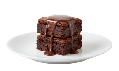 Stack of chocolate brownies with drizzled icing