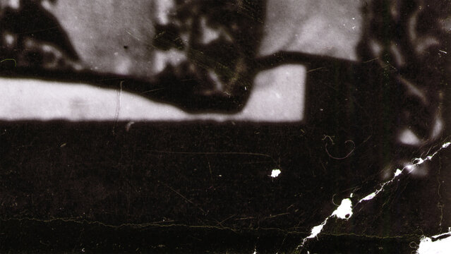 Vintage dirty grunge scan photo paper texture. Old black photo worn overlay distressed background. Vintage scratched glitch effect for design. Folded Edges. Rough grunge shabby torn ripped texture.