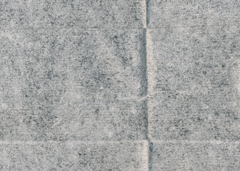 Grey old wrinkled paper texture. Crumpled soft fiber paper background.