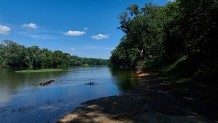 Calm peaceful river on beautiful summer day on the Potomac River at Point of Rocks, MD countryside
