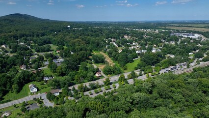 Living in a small town in Point of Rocks, Maryland with rural homes and neighborhoods with green trees and countryside in summer