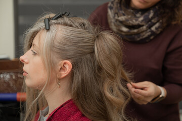 Calm Adult Woman with Styled Hair Looking Down © Ирина Санжаровская