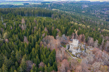 Bird's-eye view of the Wei&szlig;enstein Castle ruins, located in the middle of the forest.