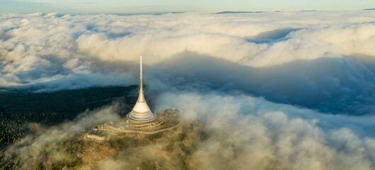 Beautiful Sunset over Famous Mountain Hotel Jested , Aerial Shot Above Clouds