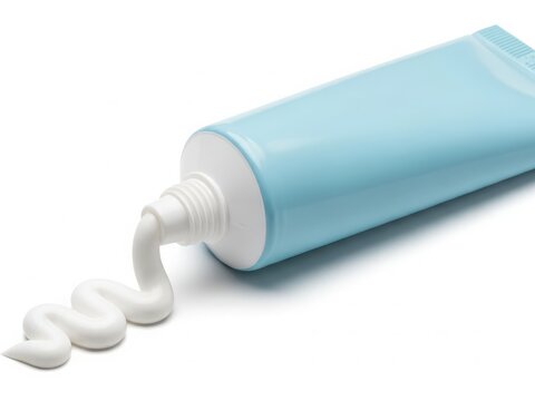 Tube of toothpaste with squeezed out paste