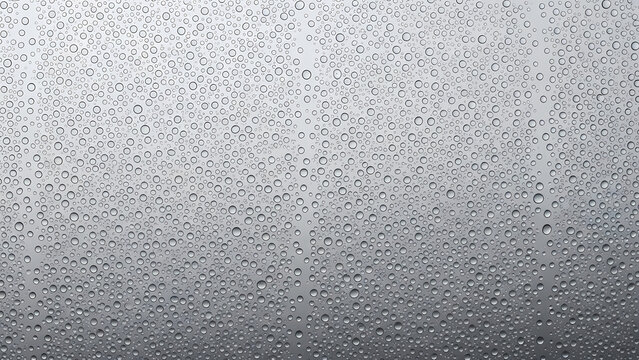 Close-up of water droplets on glass creating a textured pattern