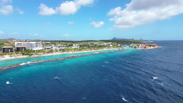 Aerial 4K Drone Footage of Cura&ccedil;ao from the Sea Showing Mambo Beach and Turquoise Caribbean Waters