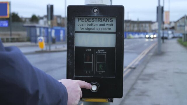 4K: A Pedestrian Crossing in the UK. The button is pressed and you wait. Traffic behind. Stock Video Clip Footage