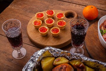Red caviar tartlets and heart-shaped salad Baked chicken breast