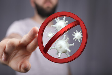 Hand pointing at red prohibition sign with 3D viruses symbolizing stopping COVID-19. Healthcare and virus prot