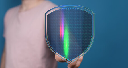 Abstract image depicting protection and security, person holding a futuristic shield, concept for cyber security and online safety, d