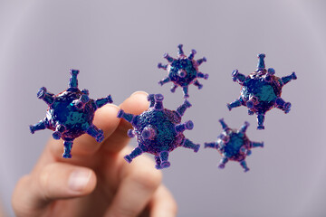 Artistic 3D rendering of virus cells in human hand. Concept illustration of infection, illness, and the Corona